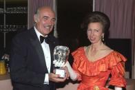 <p>Presenting <em>James Bond </em>actor Sean Connery with the special BAFTA silver mask in 1990.</p>