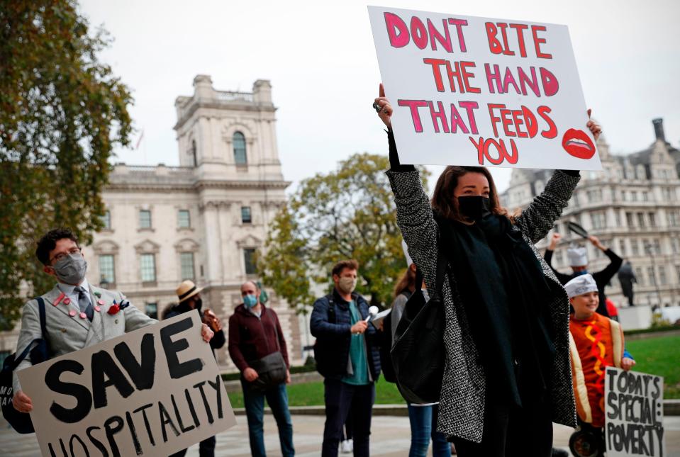 <p>Hoping to be heard: the HospoDemo in Parliament Square</p> (AFP via Getty Images)