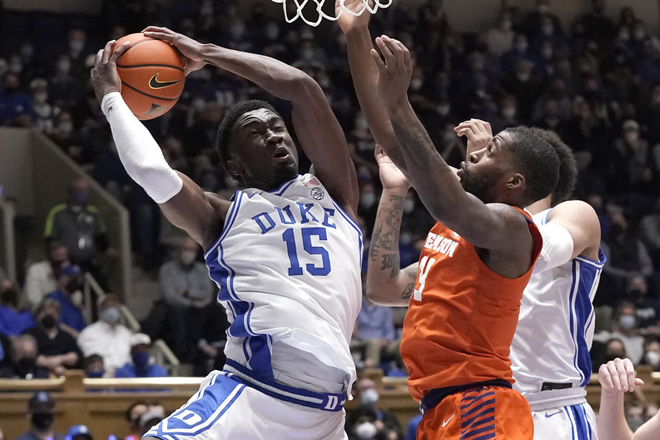Duke center Mark Williams (15) grabs a rebound against Clemson forward Naz Bohannon during the first half of an NCAA college basketball game in Durham, N.C., Tuesday, Jan. 25, 2022. (AP Photo/Gerry Broome)