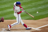 Philadelphia Phillies' Alec Bohm hits an RBI single during the first inning of a baseball game against the St. Louis Cardinals, Saturday, April 17, 2021, in Philadelphia. (AP Photo/Laurence Kesterson)