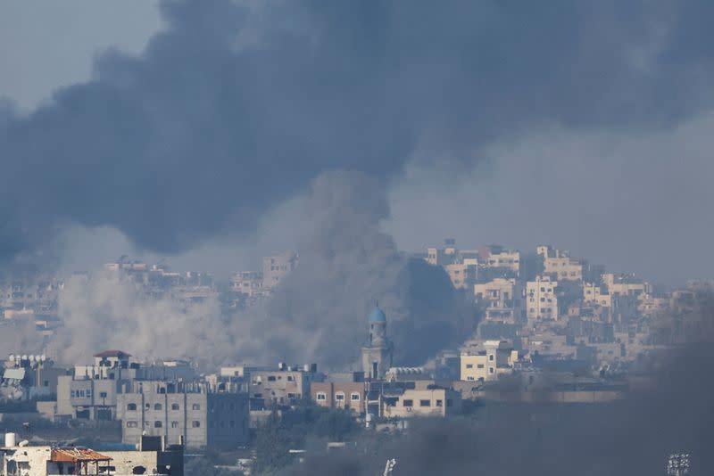 Smoke rises after Israeli air strikes in Gaza, as seen from southern Israel