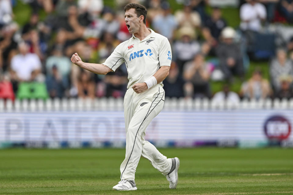 Matt Henry of New Zealand celebrates after taking the wicket of Ollie Pope of England on the first day of the second cricket test against New Zealand at the Basin Reserve in Wellington, New Zealand, Friday, Feb. 24, 2023. (Andrew Cornaga/Photosport via AP)