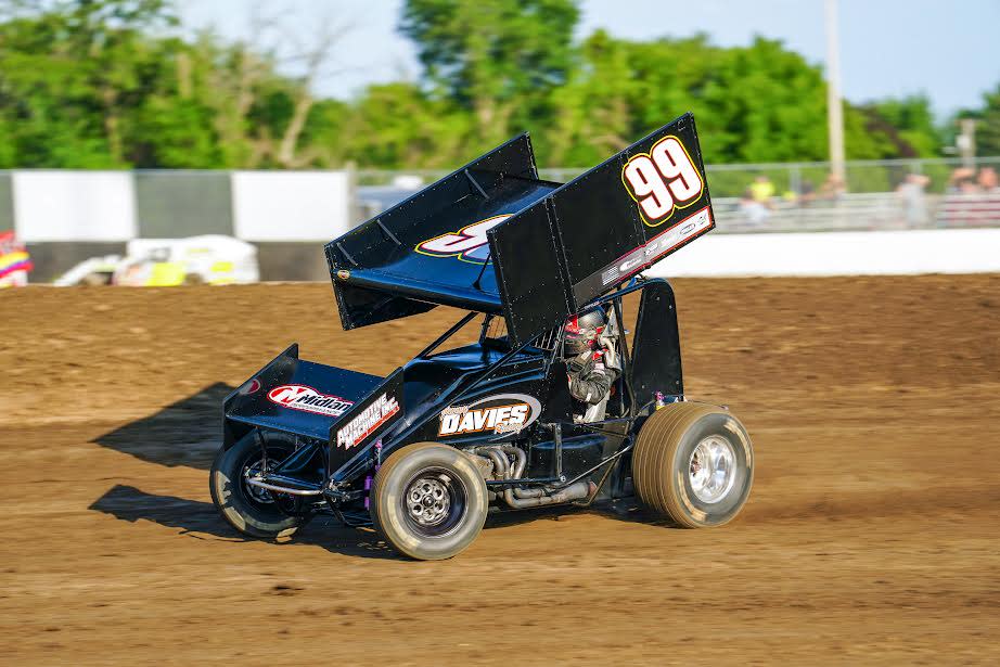 The Jimmy Davies owned sprint car #99 from Oquawka, is driven by Brett Tripplett at Davenport, Iowa Speedway during the Sprint Invader show Friday, June 24.  Davies started racing sprints back in 2000 when he earned rookie of the year honors at 34 Raceway, Burlington, Iowa.  Since 2015 he has averaged 15 different drivers.  Tripplett of Lincoln, Illinois just started this season piloting Davies car.  Tripplett has extensive experience in the racing industry as he owned a sprinter up until three years ago and since has been behind the wheel for others.