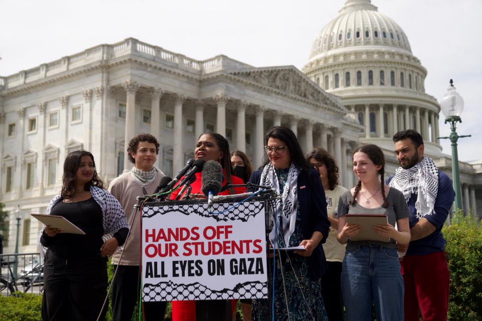 Congresswoman Cori Bush (MO-01) stands with Congresswoman Rashida Tlaib (MI-12) and George Washington University students at a press conference on Capitol Hill.