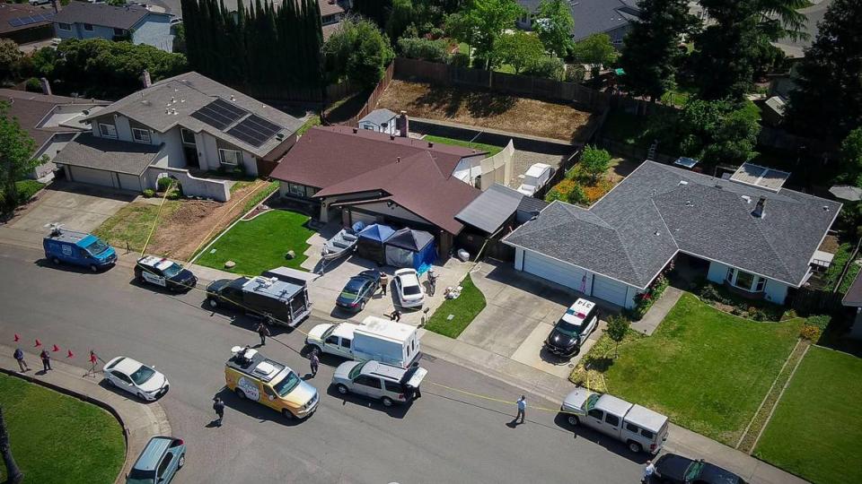Law enforcement authorities process evidence at the home of East Area Rapist Joseph James DeAngelo at his home, center, in Citrus Heights on April 25, 2018, two days after his arrest.
