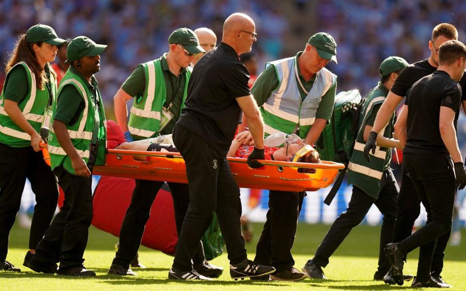 Luton Town's Tom Lockyer leaves the pitch on a stretcher after becoming injured during the Sky Bet Championship play-off final at Wembley Stadium, - PA/Adam Davy
