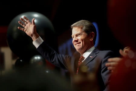FILE PHOTO: Republican gubernatorial candidate Brian Kemp reacts after appearing at his election night party in Athens , Georgia, U.S. November 7, 2018. REUTERS/Chris Aluka Berry/File Photo