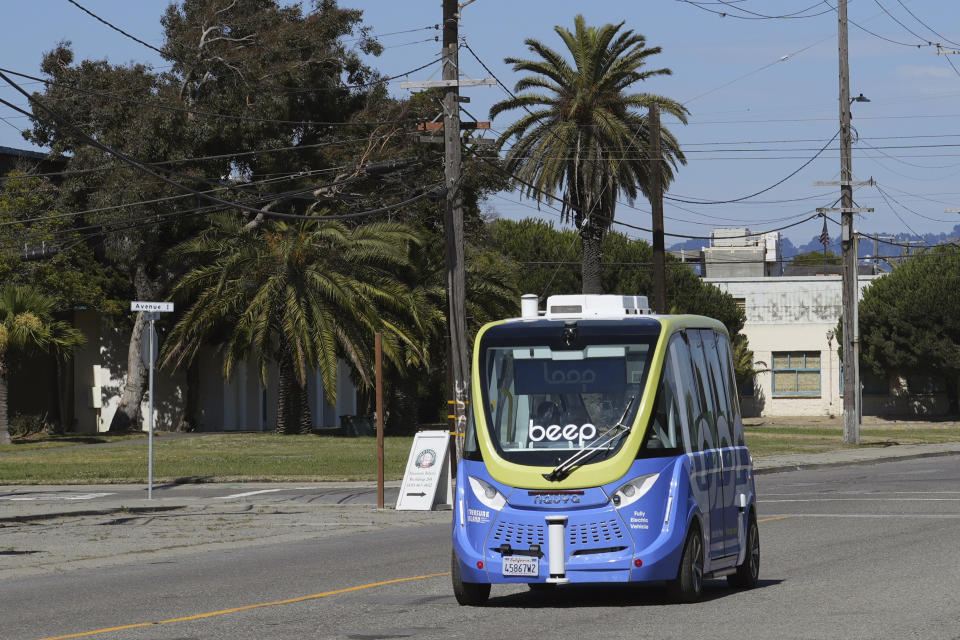 A driverless shuttle transports passengers on San Francisco's Treasure Island as part of a pilot program to assess the safety and effectiveness of autonomous vehicles for public transit on Aug. 16, 2023. The free bus service was launched less than a week after California regulators approved the controversial expansion of robotaxis on city streets. (AP Photo/Terry Chea)