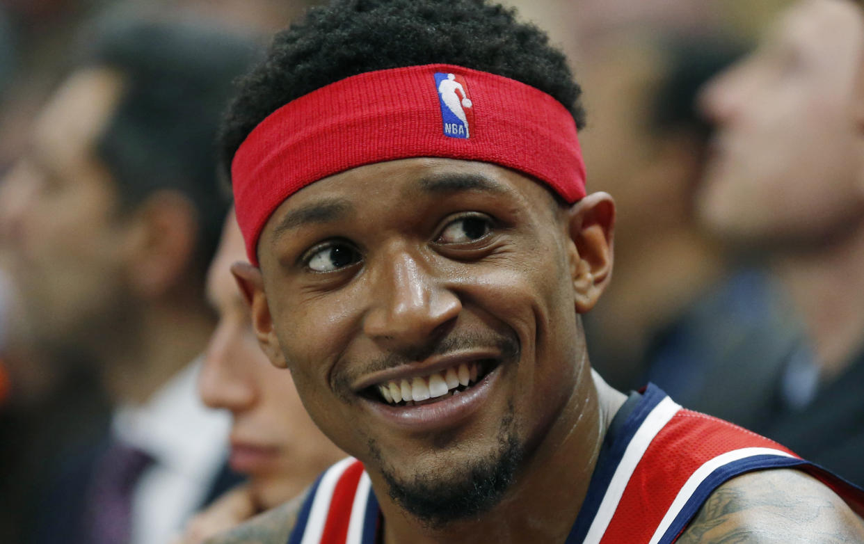 Washington Wizards guard Bradley Beal (3) smiles as he sits on the bench during the second half of an NBA basketball game against the Utah Jazz Friday, March 29, 2019, in Salt Lake City. (AP Photo/Rick Bowmer)