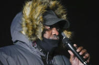 Rodney Wells, stepfather of Tyre Nichols, speaks at a prayer gathering at the site where Nichols was beaten by Memphis police officers, and later died from his injuries, in Memphis, Tenn., Monday, Jan. 30, 2023. (AP Photo/Gerald Herbert)