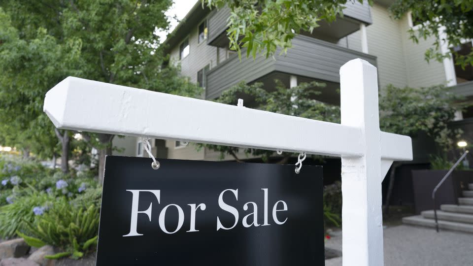 A for sale sign hangs in front of a home on August 22, 2023 in San Mateo County, California. - Liu Guanguan/China News Service/VCG/Getty Images