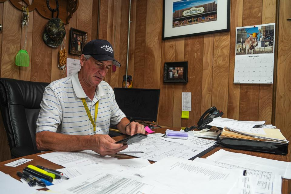 Callahan's General Store CEO, president and general manager Charley Wilson works in his office Monday at the East Austin store. The office is also the former office of his uncle, Murray Callahan, who died on March 25.