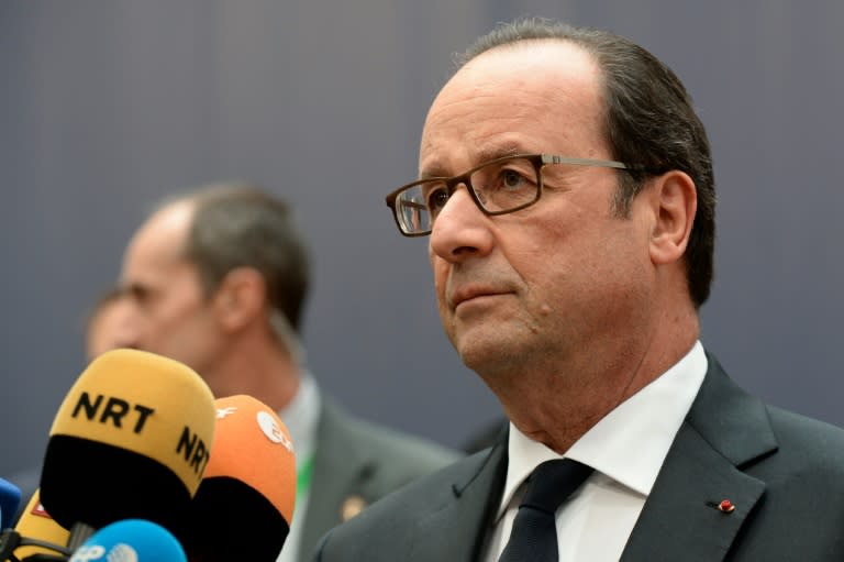 France's President Francois Hollande addresses journalists as he arrives for an European Union leaders summit, at the European Council in Brussels, on October 20, 2016