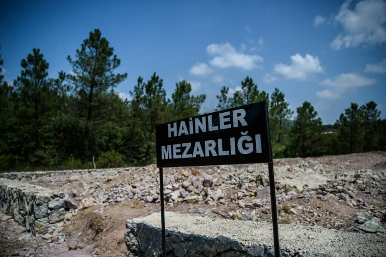 A sign reading in Turkish "Traitors' Cemetery" marks a barren piece of ground selected for the burial of Turkish soldiers who took part in a failed coup