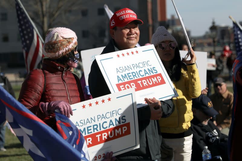 People protest against election results in Lansing, Michigan