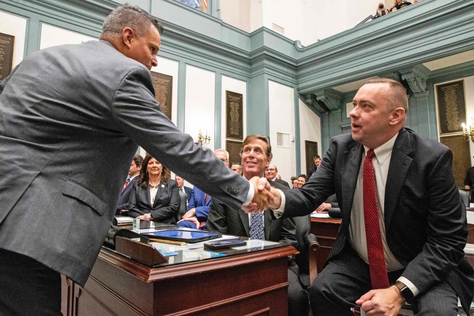 Legislators mingle in advance of Gov. John Carney's State of the State Address at Legislative Hall in Dover, Tuesday, March 5, 2024. The event was rescheduled from January after Carney fell ill.