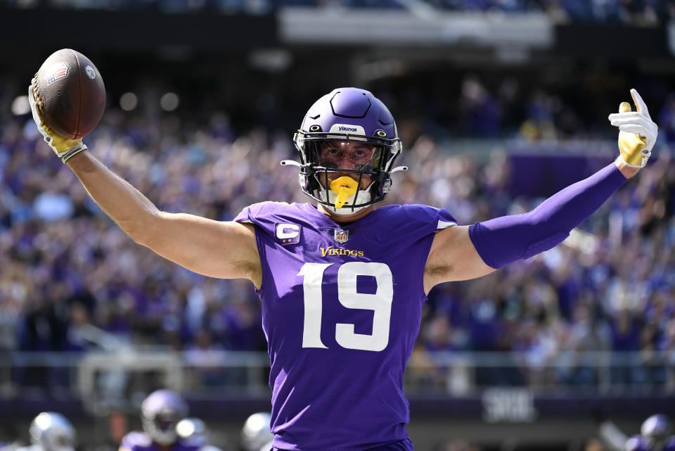 Minnesota Vikings wide receiver Adam Thielen (19) celebrates after catching a 1-yard touchdown pass during the first half of an NFL football game against the Detroit Lions, Sunday, Sept. 25, 2022, in Minneapolis. (AP Photo/Craig Lassig)