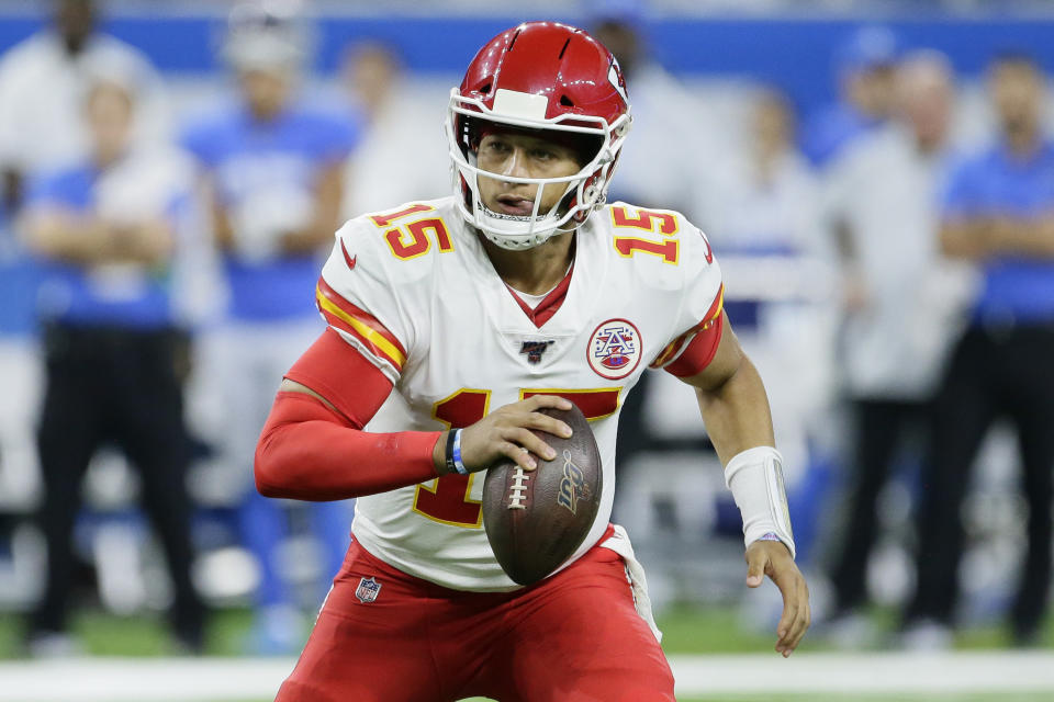 Kansas City Chiefs quarterback Patrick Mahomes scrambles during the first half of an NFL football game against the Detroit Lions, Sunday, Sept. 29, 2019, in Detroit. (AP Photo/Duane Burleson)