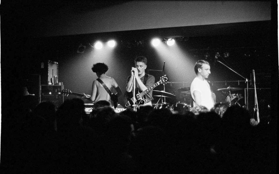 New Order on stage at the Hacienda in 1983 - camera press