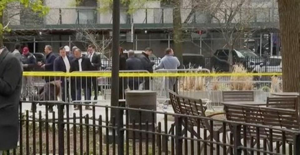 Law enforcement officers, pictured, responded to reports of self-immolation outside Manhattan Criminal Court just after 1:30 p.m. local time (ABC News)