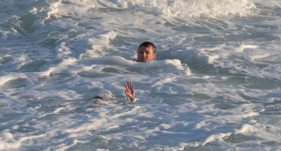 The woman was caught under 10ft waves at Bronte Beach before being saved by Bondi Rescue Lifeguards