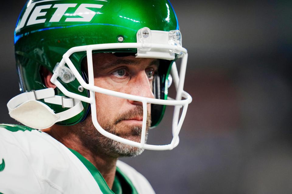 New York Jets quarterback Aaron Rodgers (8) warms up before an NFL football game against the Buffalo Bills on Monday, Sept. 11, 2023, in East Rutherford, N.J.