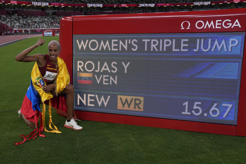 Yulimar Rojas, of Venezuela, celebrates after winning the final of the women's triple jump at the 2020 Summer Olympics, Sunday, Aug. 1, 2021, in Tokyo. (AP Photo/David J. Phillip)