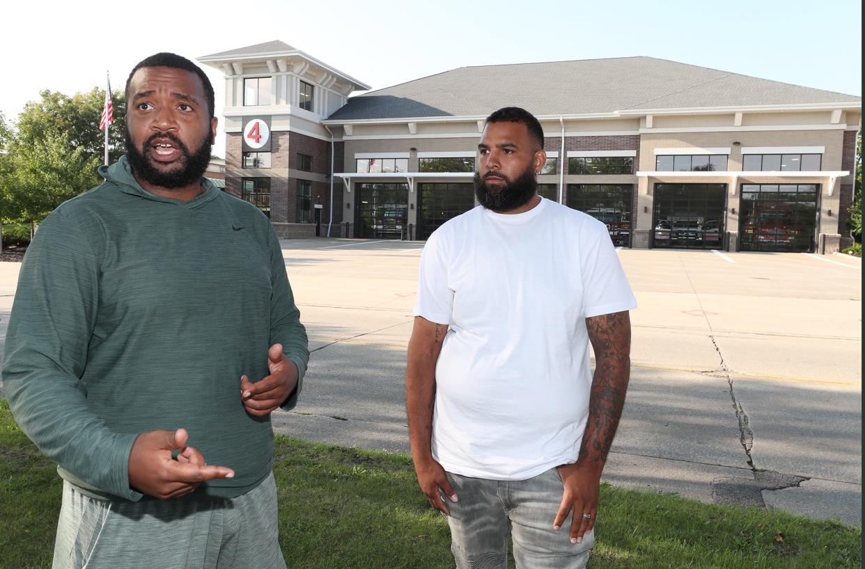 Bryan Taylor and Ezekiel Hobdy, former applicants for the Akron Fire Department, talk about what they say were shortcomings in the hiring process across the street from the department's administration on Thornton Street.