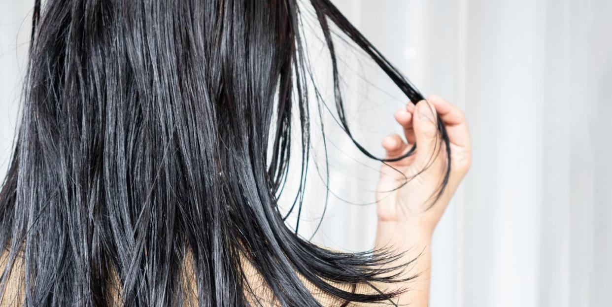 woman have problems with oily hair and thinning hair