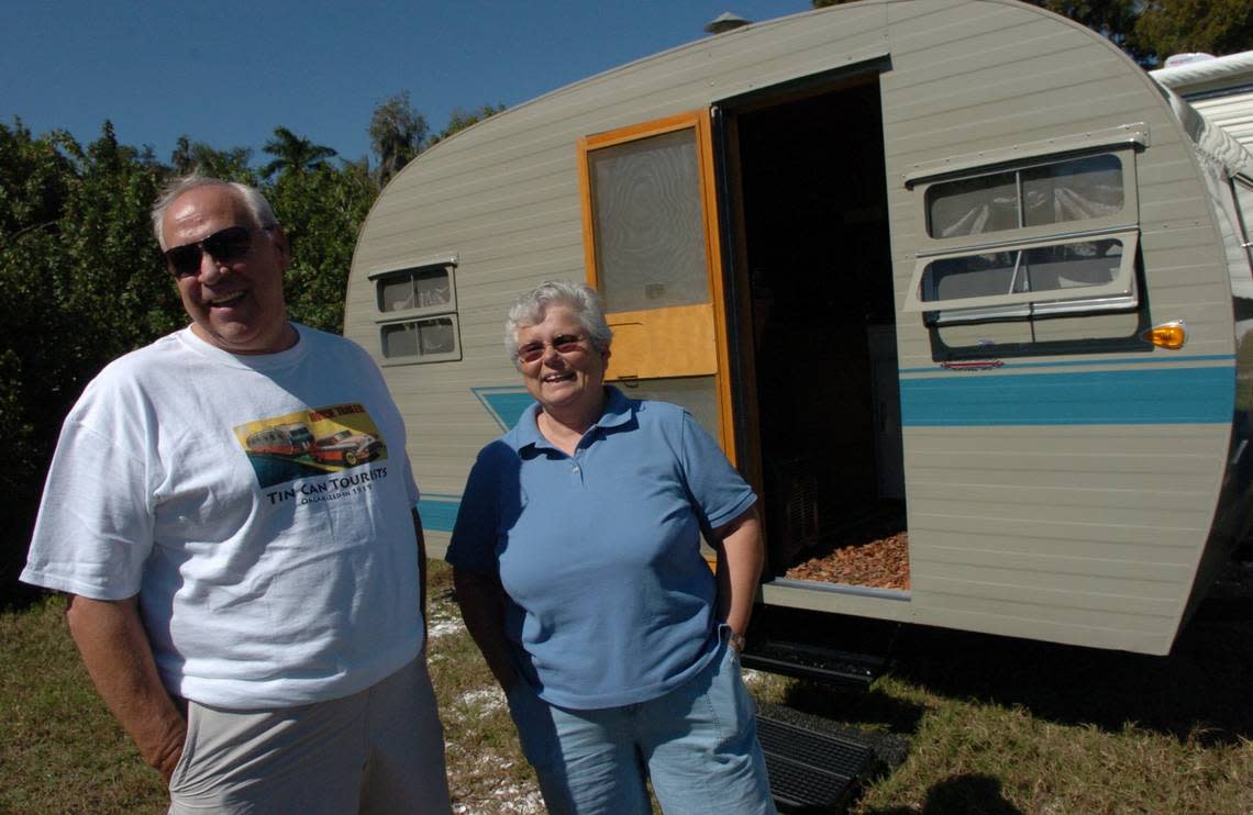 Forrest and Jeri Bone, with their 1955 Trotwood Cub, part of a past Tin Can Tourist event at Lake Manatee State Park. 
