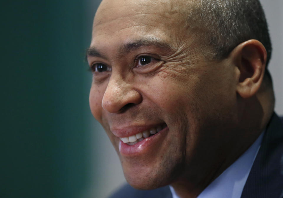 FILE - In this Dec. 15, 2014, file photo, Massachusetts Gov. Deval Patrick speaks during an interview at his Statehouse office in Boston. Former Massachusetts Gov. Patrick is considering making a late run for the Democratic presidential nomination. That is according to people with knowledge of Patrick’s deliberations. (AP Photo/Elise Amendola, File)