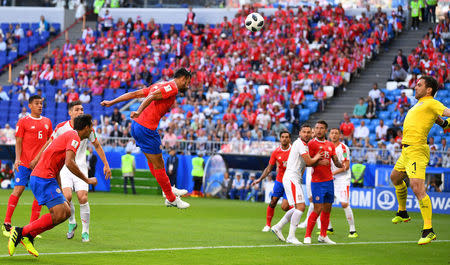 Soccer Football - World Cup - Group E - Costa Rica vs Serbia - Samara Arena, Samara, Russia - June 17, 2018 Costa Rica's Giancarlo Gonzalez heads at goal REUTERS/Dylan Martinez
