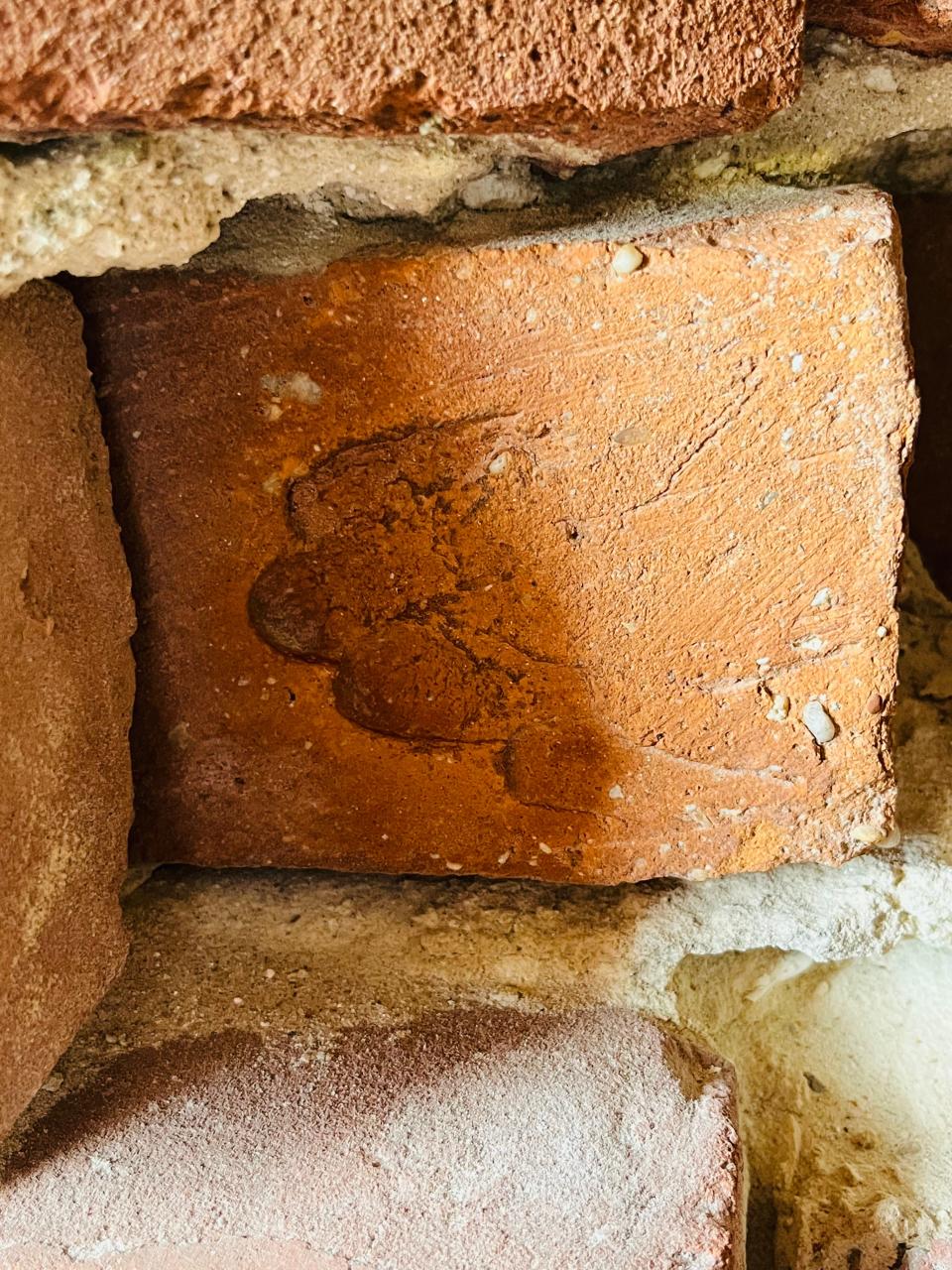 On some brickwork at Fort Pulaski fingerprints of the slaves who made them can be seen.