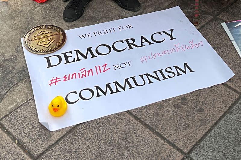 A message reading "We fight for Democracy not Communism" is pictured during a protest demanding reforms on the monarchy in Bangkok