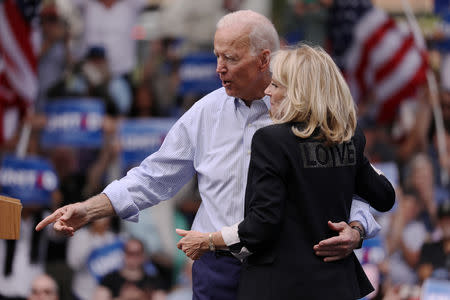 U.S. Democratic presidential candidate and former Vice President Joe Biden hugs his wife Jill after speaking at the kickoff rally of his campaign for the 2020 Democratic presidental nomination in Philadelphia, Pennsylvania, U.S., May 18, 2019. REUTERS/Jonathan Ernst