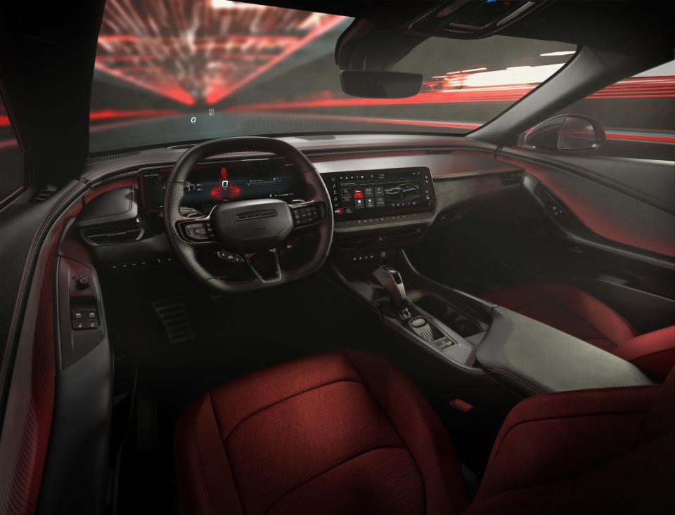 The interior of the 2024 Dodge Charger Daytona Scat Pack includes a pistol-grip shifter.