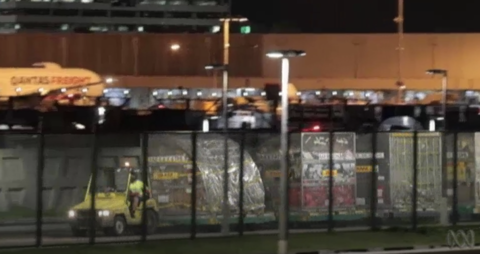 The plane's cargo being transported at the airport. Source: ABC