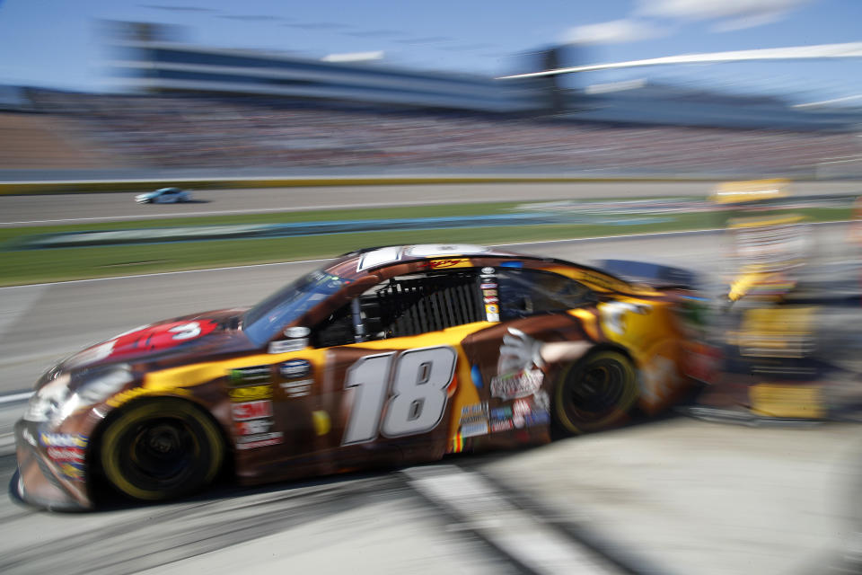 Kyle Busch drives out of his pit during a NASCAR Cup Series auto race at Las Vegas Motor Speedway, Sunday, March 3, 2019, in Las Vegas. (AP Photo/John Locher)