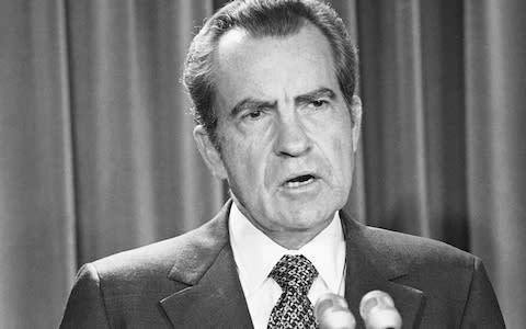 Richard Nixon speaking during a 1973 news briefing - Credit: AP