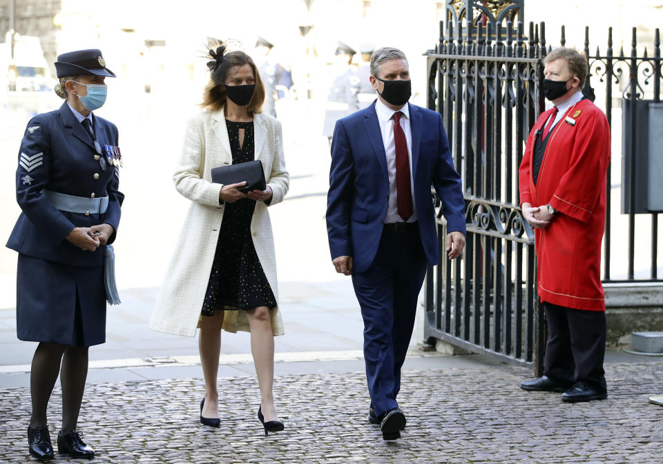 Britain's Labour party leader Sir Keir Starmer and his wife Victoria, center, arrive for a service to mark the 80th anniversary of the Battle of Britain at Westminster Abbey, London, Sunday, Sept. 20, 2020. (Aaron Chown/Pool Photo via AP)