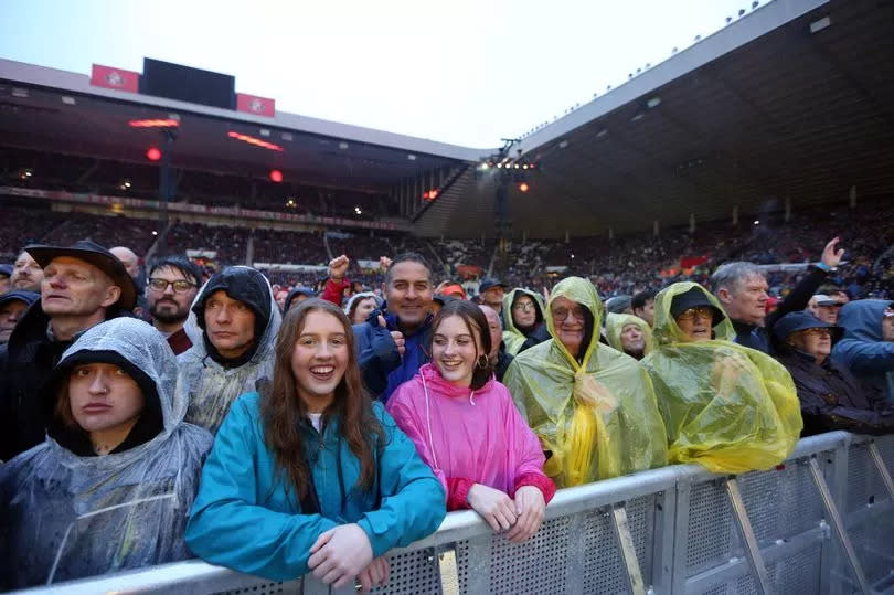 Bruce Springsteen playing to thousands of fans at the stadium of light