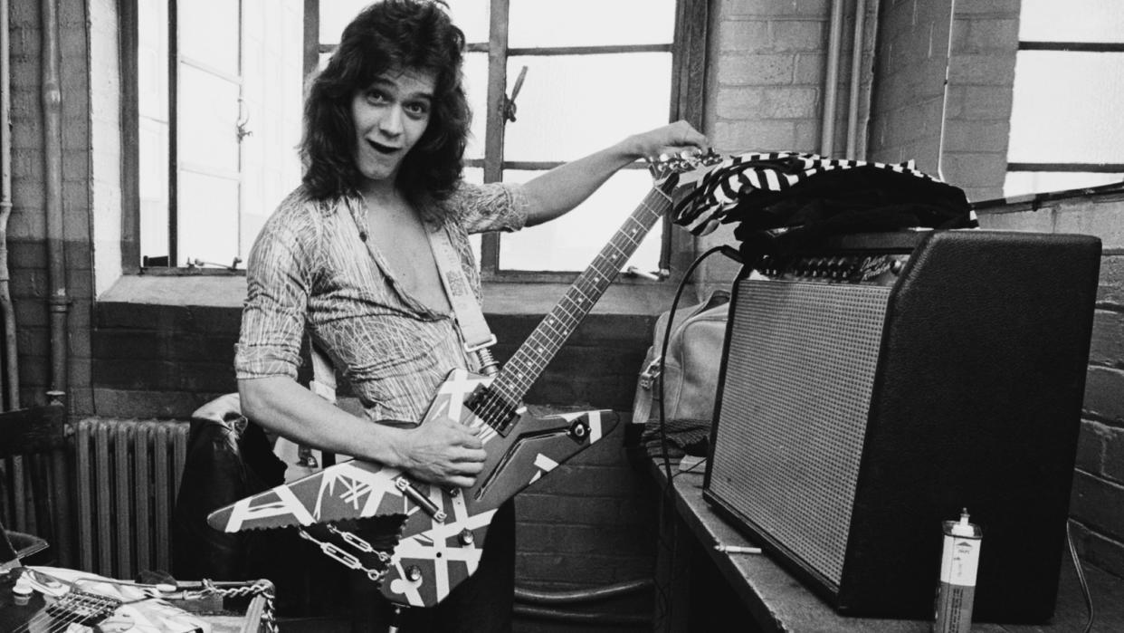  Eddie Van Halen warming up backstage before a show in London in 1978. 