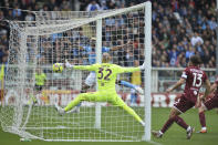 Napoli's Victor Osimhen scores his side's third goal during the Serie A soccer match between Torino and Napoli at the Turin Olympic stadium, Italy, Sunday, March 19, 2023. (Alberto Gandolfo/LaPresse via AP)