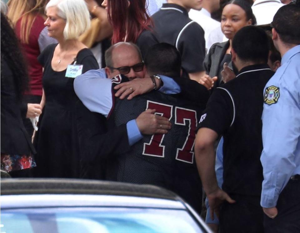 Mourners at Aaron Feis' funeral