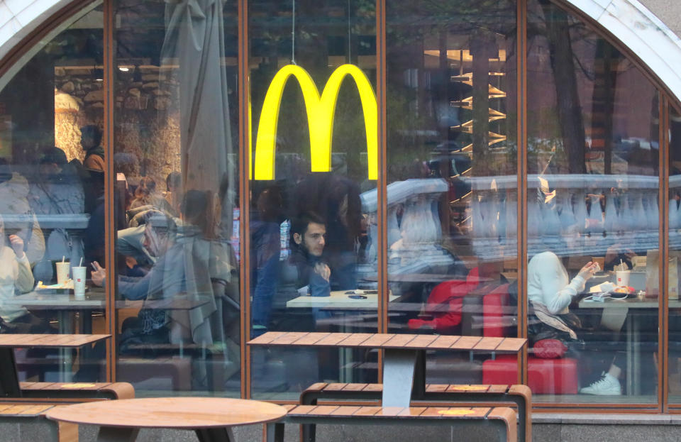 MOSCOW, RUSSIA  OCTOBER 21, 2021: People in a McDonald's fast food restaurant in Bolshaya Bronnaya Street. Vladimir Gerdo/TASS (Photo by Vladimir Gerdo\TASS via Getty Images)