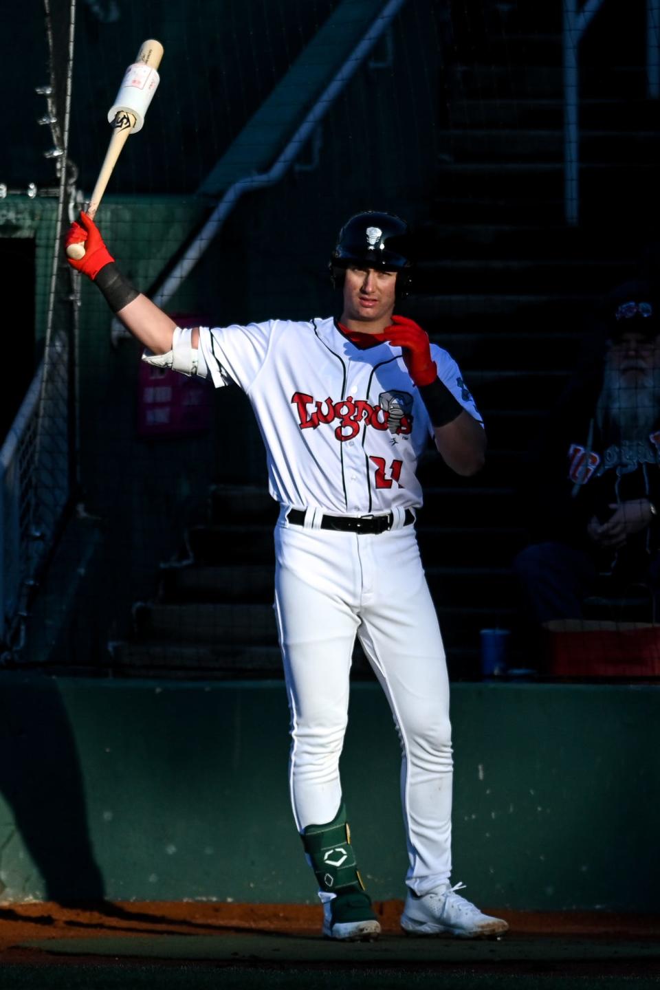 Lugnuts catcher Tyler Soderstrom warms up before batting in the first inning on Wednesday, April 6, 2022, during the Crosstown Showdown against Michigan State at Jackson Field in Lansing. Diamond Baseball Holdings reached an agreement to purchase the Lugnuts last week.