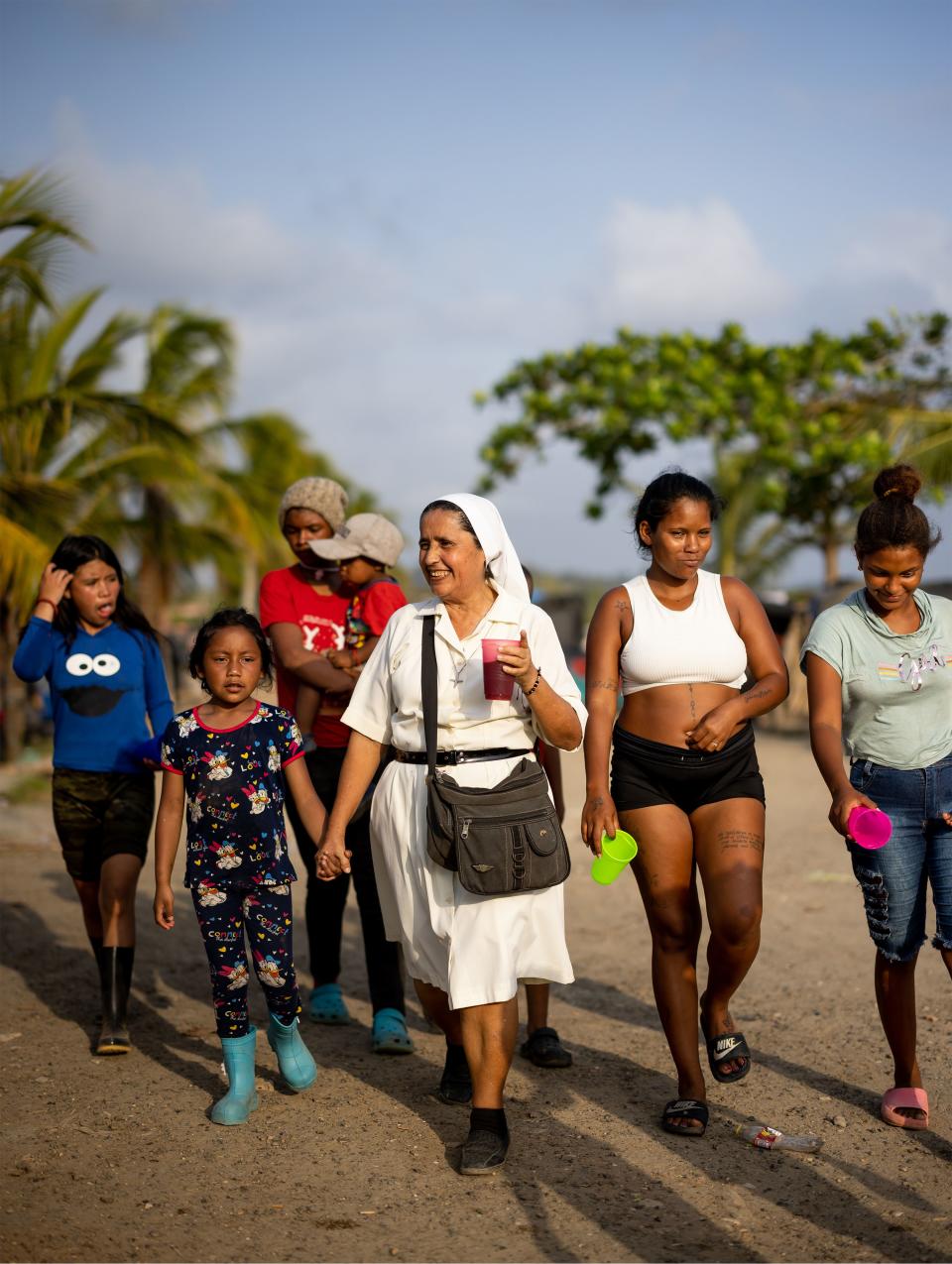 While migrants await passage into the Darién gap, the sisters from Our Lady of Mount Carmel, including Sister Cecilia Maldonado, pictured here, offer moral and spiritual support — and provide as much food, clothing and medical supplies as the parish’s small budget allows. | Spenser Heaps, Deseret News