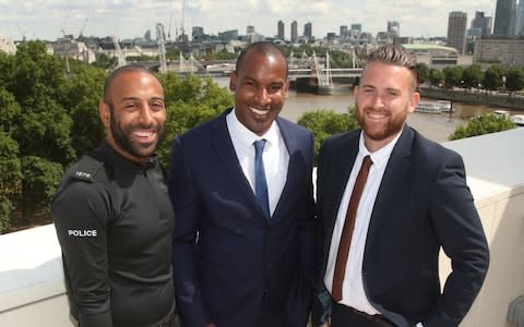 British Transport Police officers PC Leon McLeod and PC Wayne Marques, and Metropolitan Police officer PC Charles Guenigault, at New Scotland Yard, London - Credit: Yui Mok/PA