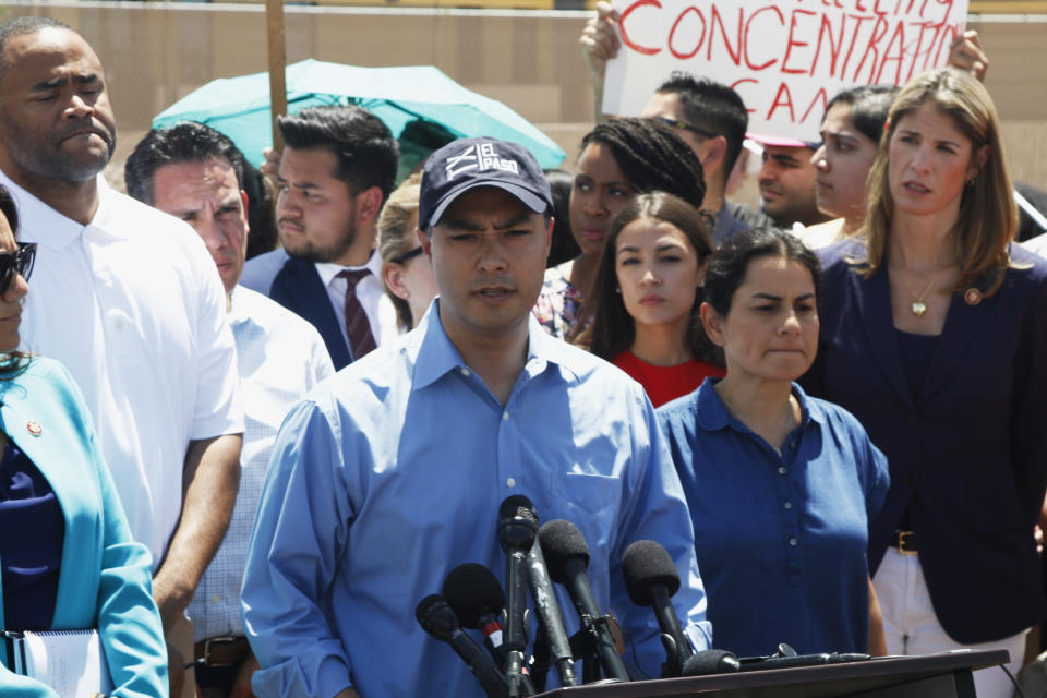 Rep. Joaquin Castro speaks alongside members of the Hispanic Caucus after touring inside of the Border Patrol station in Clint, Texas, Monday, July 1, 2019. Castro's identical twin, presidential candidate Julian Castro, held a rally outside the building over the weekend. (AP Photo/Cedar Attanasio)