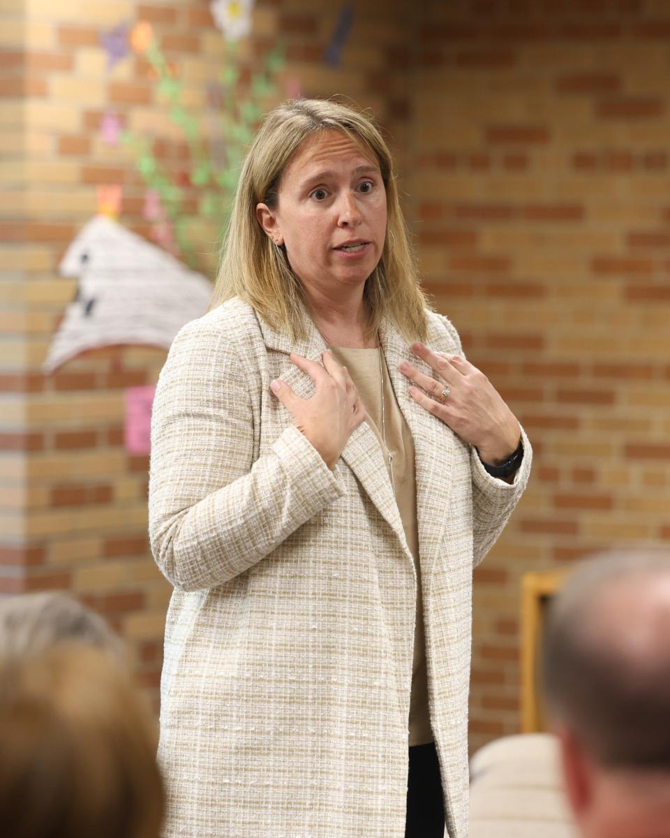 Candidate for superintendent of Kent City Schools and current superintendent of Windham Exempted Village Schools, Aireane Curtis, speaks to community members and school staff at a forum Tuesday at Kent Roosevelt High School.